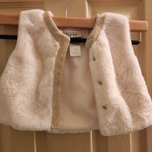 Soft, fluffy Holiday jacket for toddler